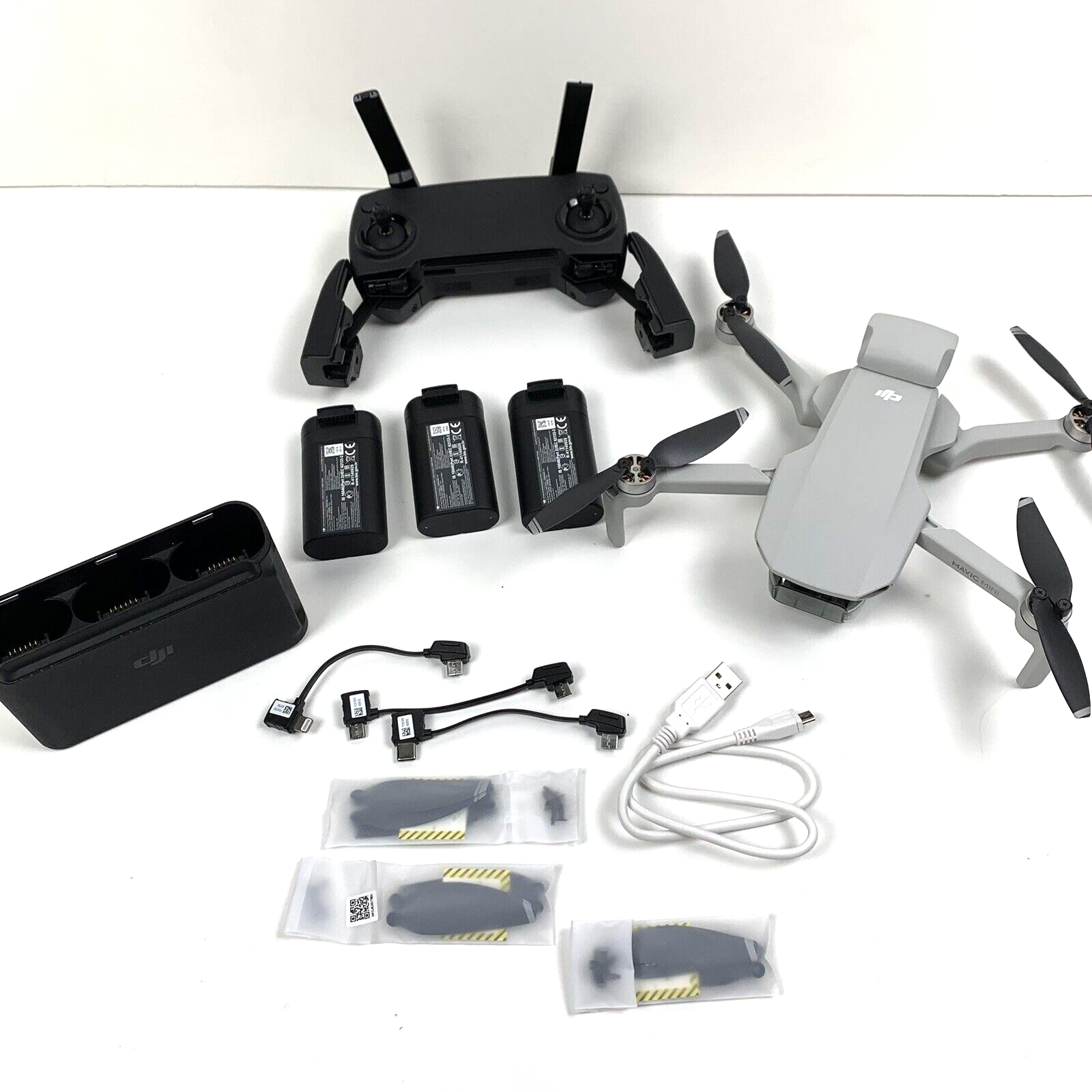 DJI Mavic Mini Fly More Combo - PRE-OWNED - Premium Drone from DJI - Just $275! Shop now at Eagleview Drones